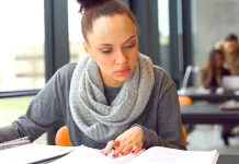 a student studying in preparation for a certification exam