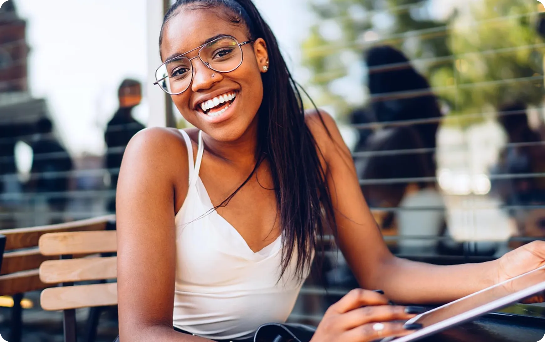 woman wearing glasses smiling