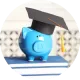 A piggy bank wearing a graduation cap