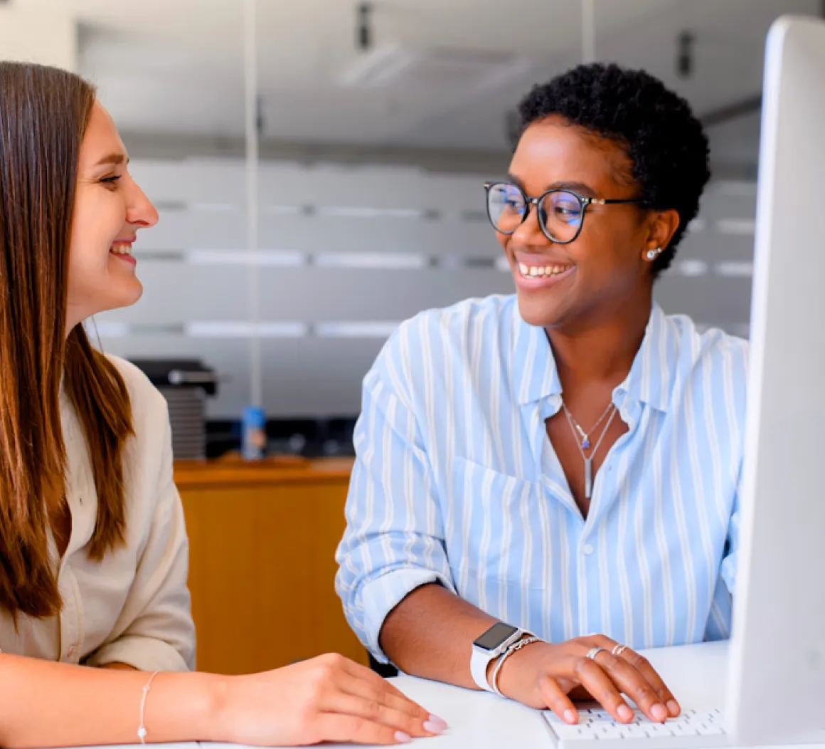 A professional assisting someone in an office setting