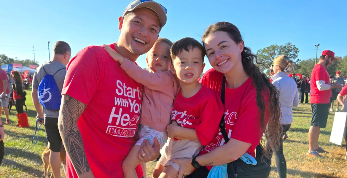 lady with smile looking at computer