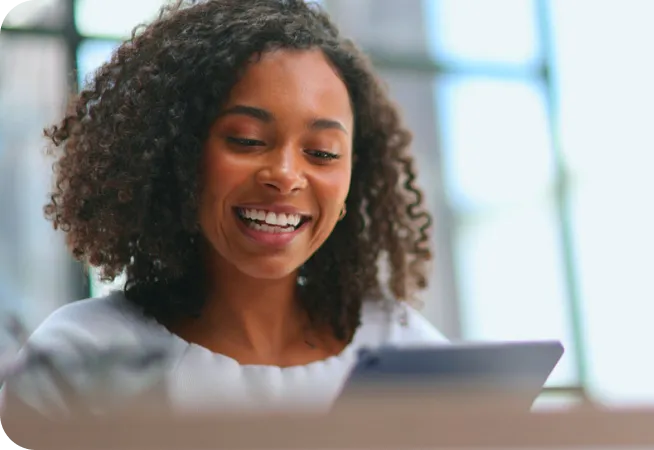 woman smiling while taking a healthcare career quiz