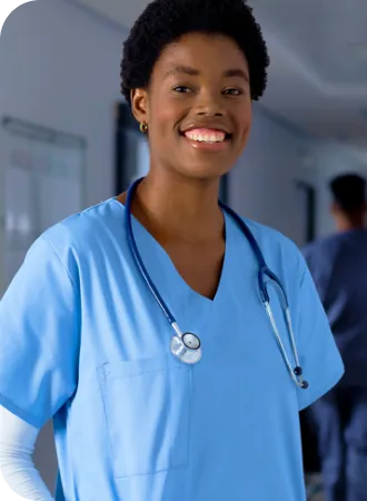 A healthcare professional smiling on the job